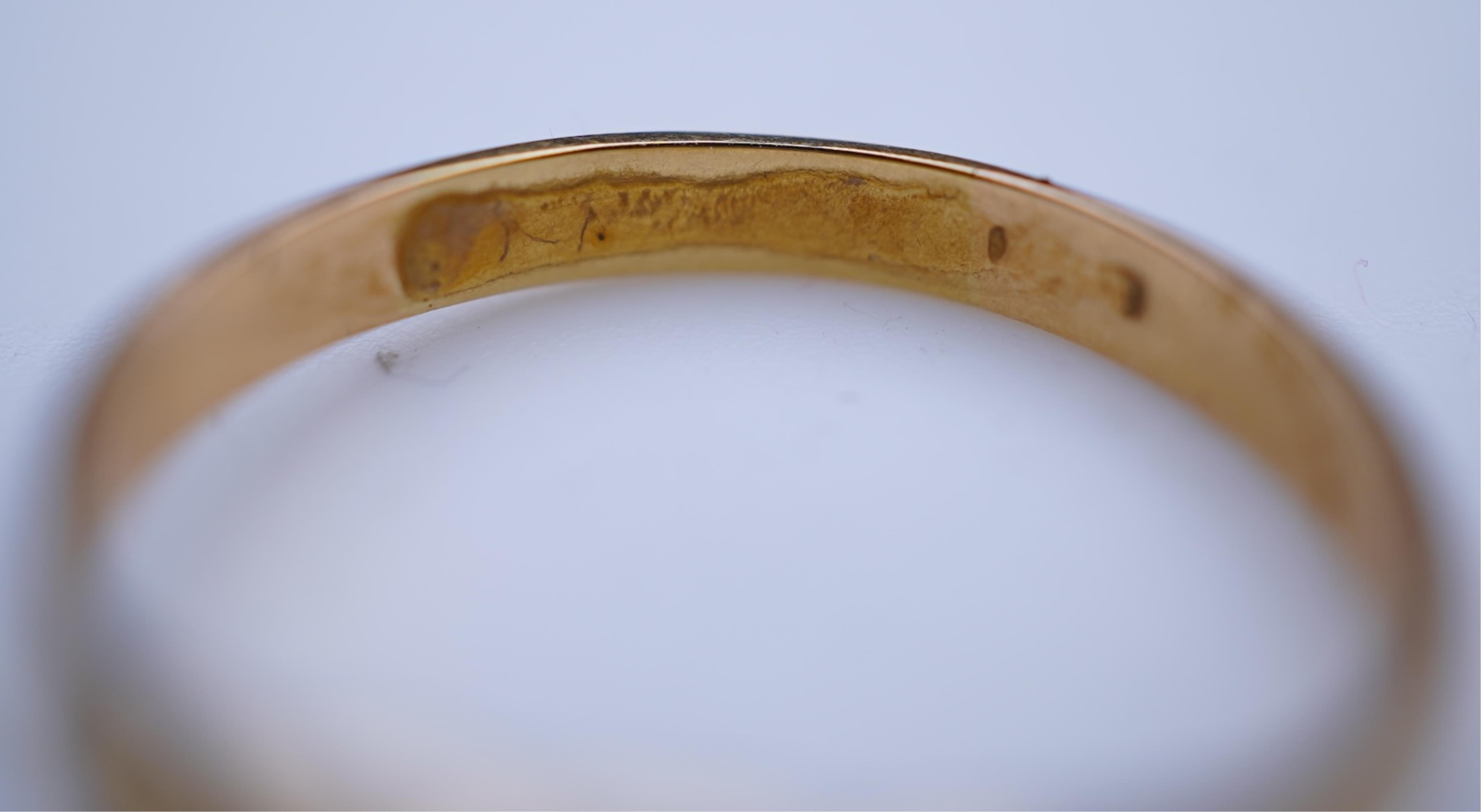 Two gold and diamond rings